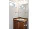 Bathroom vanity featuring tile countertop, modern fixtures, and updated lighting at 7440 E 8Th Ave # 25, Denver, CO 80230