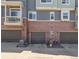 Attached garages, offering convenience and security, enhance this townhome complex at 7440 E 8Th Ave # 25, Denver, CO 80230
