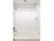 Clean and bright white tiled shower featuring modern fixtures and design at 7440 E 8Th Ave # 25, Denver, CO 80230
