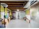 Unfinished basement space featuring exposed ceiling and concrete floor at 9741 Chambers Dr, Commerce City, CO 80022