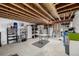 Spacious unfinished basement with exposed ceiling, and open floor plan for future expansion at 9741 Chambers Dr, Commerce City, CO 80022