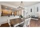 Open-concept dining room, adjacent to kitchen and living room, great for gatherings at 6687 S Forest Way # E, Centennial, CO 80121