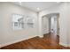 Entryway and hardwood floors are featured in this neutral living space at 6687 S Forest Way # E, Centennial, CO 80121