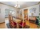 Inviting dining room with rustic wooden table and chairs, and stylish decor throughout the space at 2995 Albion St, Denver, CO 80207