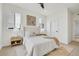 Stylish bedroom featuring natural light, cozy bedding, and contemporary furnishings for a serene and inviting space at 9081 Westminster Blvd, Westminster, CO 80031