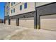 Exterior view of garages with multiple parking spaces at 9081 Westminster Blvd, Westminster, CO 80031