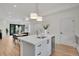 Bright, open-concept kitchen and dining area with modern appliances and stylish decor at 9081 Westminster Blvd, Westminster, CO 80031