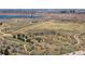 Scenic aerial view showcasing a park and lake, offering a picturesque natural setting at 13950 E Oxford Pl # B105, Aurora, CO 80014