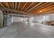 Spacious unfinished basement offering potential for future expansion and storage at 42073 Colonial Trl, Elizabeth, CO 80107