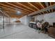 Unfinished basement with exposed ceiling, perfect for customization and storage at 42073 Colonial Trl, Elizabeth, CO 80107