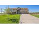 Attractive single Gathering home with large front yard, a big driveway and attached garage at 42073 Colonial Trl, Elizabeth, CO 80107