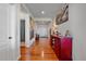 Elegant hallway with wood floors, neutral walls, and stylish furnishings, creating a welcoming entrance at 42073 Colonial Trl, Elizabeth, CO 80107