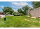 Well-maintained lawn and greenery surround this lovely home with mature trees and a partially fenced yard at 1152 S Yosemite Way # 29, Denver, CO 80247