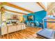 Inviting living room with exposed beams, a brick fireplace, and a mix of textures at 1152 S Yosemite Way # 29, Denver, CO 80247