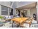 Inviting patio with stylish seating, perfect for outdoor relaxation and entertaining with a great rug and pleasant light at 1152 S Yosemite Way # 29, Denver, CO 80247