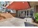 Building entrance featuring modern glass doors, well-maintained landscaping, and an inviting facade at 2500 S York St # 310, Denver, CO 80210