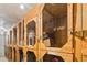 Storage area with wooden lockers featuring chicken wire fronts, perfect for organizing belongings at 2500 S York St # 310, Denver, CO 80210
