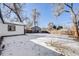 Large backyard with a snow covered lawn at 4745 S Sherman St, Englewood, CO 80113