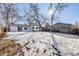 Large backyard with a snow covered lawn at 4745 S Sherman St, Englewood, CO 80113