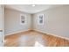 Bright bedroom with hardwood floors and neutral walls at 4745 S Sherman St, Englewood, CO 80113