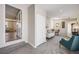 Comfortable living room featuring plush seating, carpet, and natural light at 4745 S Sherman St, Englewood, CO 80113