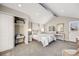 Spacious main bedroom featuring vaulted ceiling, closet and French doors at 4745 S Sherman St, Englewood, CO 80113