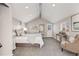 Spacious main bedroom featuring vaulted ceiling, closet and French doors at 4745 S Sherman St, Englewood, CO 80113