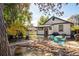 Backyard patio with seating area and fire pit at 4860 Stuart St, Denver, CO 80212