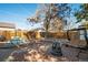 Landscaped backyard with patio, fire pit, and seating at 4860 Stuart St, Denver, CO 80212