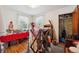 Bedroom with two windows, a full closet, and seasonal decorations at 675 Holland St, Lakewood, CO 80215