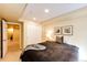 Bedroom with carpet, a sliding door closet and view to another space at 7083 Leopard Dr, Lone Tree, CO 80124
