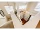 Bright foyer with high ceilings, staircase, neutral paint, and wood and carpet flooring at 7083 Leopard Dr, Lone Tree, CO 80124