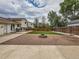 Spacious backyard featuring a fire pit area, lush green grass, and a sturdy wooden fence at 380 S 25Th Ave, Brighton, CO 80601