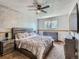 Spacious bedroom with large window, ceiling fan, and full furniture set at 380 S 25Th Ave, Brighton, CO 80601