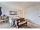 Inviting bedroom with soft carpet, accent art, and natural light, ideal for a relaxing retreat at 1313 Steele St # 606, Denver, CO 80206