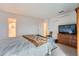 Comfortable bedroom with neutral carpet, a TV, and ample closet space for organized living at 1313 Steele St # 606, Denver, CO 80206