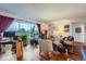 Comfortable living room featuring a large window, hardwood floors and neutral decor at 1313 Steele St # 606, Denver, CO 80206