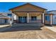 Charming home with a covered patio, ideal for outdoor living and relaxing in style at 9141 Telluride Ct, Commerce City, CO 80022