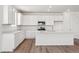 Well-appointed kitchen with stainless steel appliances and a spacious island, perfect for cooking and entertaining at 9141 Telluride Ct, Commerce City, CO 80022