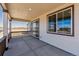 Covered patio with recessed lighting and beautiful view, perfect for relaxing and entertaining guests at 9141 Telluride Ct, Commerce City, CO 80022
