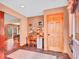 Inviting entryway features a study desk and unique tile flooring, with a dining room view at 30813 Kings Valley Dr, Conifer, CO 80433