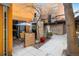 Modern backyard with outdoor patio featuring a dining area, landscaping, and contemporary design at 801 Confidence Dr # 2, Longmont, CO 80504