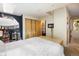 Bright bedroom featuring closet space with a door that leads to the kitchen at 801 Confidence Dr # 2, Longmont, CO 80504