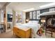 Well-lit bedroom enhanced by skylights, featuring a unique loft bed and stylish decor, creating a cozy space at 801 Confidence Dr # 2, Longmont, CO 80504