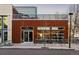 Street view of building showing storefront restaurant with modern exterior and outdoor seating at 801 Confidence Dr # 2, Longmont, CO 80504