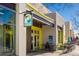 Quaint storefront with inviting entrance, a distinctive sign for Prospect Apothecary, and outdoor seating at 801 Confidence Dr # 2, Longmont, CO 80504