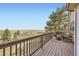 Spacious outdoor deck perfect for relaxing and enjoying the surrounding country views at 49950 Oak Park Dr, Bennett, CO 80102