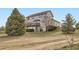 Charming two-story home with walkout basement situated on a sprawling lot at 49950 Oak Park Dr, Bennett, CO 80102