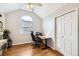 Office with hardwood floors, natural light, vaulted ceiling, and closet at 49950 Oak Park Dr, Bennett, CO 80102