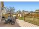 Outdoor deck area, furnished with table and chairs, perfect for dining and relaxing at 6367 Xavier St, Arvada, CO 80003